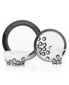 Circle 'round the table for a taste of retro fun! From Mikasa dinnerware, dishes in these porcelain Circle Chic black place settings feature ebony rings that bounce playfully around in a mod pattern for festive everyday meals and entertaining. Black rims contrast white plates while accompanying pieces share a stylish flare. (Clearance)