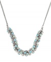 Spark a conversation in Fossil's glamorous Glitz necklace. Features sparkling blue and clear crystals strung from a ball shot chain with a lobster claw closure. Set in silver tone mixed metal. Approximate length: 18 inches + 2-inch extender.