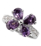 Look pretty and poised in purple. City by City ring features fresh flower petals of pear-cut, purple cubic zirconias (8-3/8 ct. t.w.). Crafted in silver tone mixed metal. Size 5, 6, 7, 8 and 9.