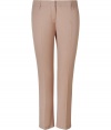 Elegant pant in fine, pale rose nylon and cotton stretch blend - Modern, narrow cut is slim through calves, crops at ankles - Crease detail extends from hip to hem, elongating and flattering the silhouette - Pockets at sides, welt pockets at rear - Lower rise with belt loops and tab closure - Polished and chic, ideal for both work and evenings out - Pair with a silk or sequin top, a jacket and platform pumps