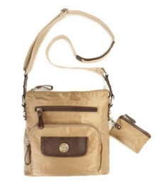 A lightweight and colorful crossbody from Giani Bernini that's packed with thoughtful organization features. A lightweight and colorful crossbody from Giani Bernini that's packed with thoughtful organization features.