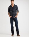 It might look like a simple shirt but this rich plaid has a complementary gingham lining, adding interest and a little extra weight, plus pockets with rich leather trim. Spread collar Button patch chest pockets Front button placket Angled front slash pockets with leather trim Long sleeves with button cuffs and roll-up tabs Cotton Machine wash Imported