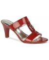 Shiny, cute, and strappy. Etiena Aigner's Milo sandals feature a small heel and shiny buckle detail along the vamp.