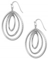 With an eye-catching design, these triple-oval earrings from Anne Klein can take center stage or complement a look. Crafted in imitation rhodium-plated mixed metal. Approximate drop: 2 inches.