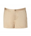 Polished and pretty these khaki shorts update the preppy look with a sateen shine - Made of 100% cotton they feel great on and are the perfect weight for summer style - Features slim, side pockets, and two back pockets, short zip and gold-colored button - Feminine length is short but sophisticated - Wear with a simple cotton tank, metallic leather thongs and a favorite oversized tote