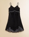 Crafted in lightweight crinkle chiffon, this flowy, Empire-waist frock has pretty braided detail for extra flair.V-neckBraided spaghetti strapsSide zipperPleated bodiceEmpire waist with braided detailFully linedPolyesterHand washImported