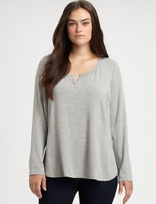 Inspired by athletic style, but with a decidedly feminine shape, a jersey top with intriguing seams. It will pair exquisitely with skinny jeans.Split neckLong sleevesPull-on styleCurved hemAbout 26 from shoulder to hemModal/spandexMachine washMade in USA