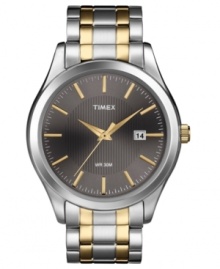 A handsome timepiece from Timex built for style and functionality, with structured steel and golden tones.