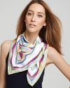 Bursts of colorful geometric shapes accent this stylish silk twill scarf from Emilio Pucci.