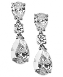 Indulge in the finer elements of style. These gorgeous drop earrings by Givenchy feature sparkling round and pear-cut cubic zirconias (14-5/8 ct. t.w.) set in silver tone mixed metal. Approximate drop: 1-1/2 inches.