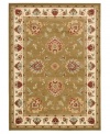Bring the brilliance of ancient Persian textile design home with the green and ivory Lyndhurst area rug from Safavieh. Crafted from soft polypropylene, this rug radiates timeless allure with the added convenience of easy-care construction. (Clearance)