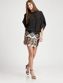 EXCLUSIVELY AT SAKS. This sexy blouson silk style features a Navajo-printed sequined skirt.BoatneckBatwing sleevesSequined stretch skirtAbout 17 from natural waistSilkSpot cleanImportedModel shown is 5'11 (180cm) wearing US size Small. 