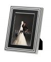 Add new elegance to beautiful memories with Vera Wang's With Love Noir picture frame. Geometric detail lends metallic shimmer to chic black enamel in a home accent that invokes modern and deco design.