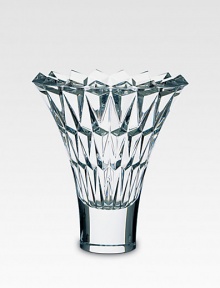 A beautiful crystal vase is handcrafted with a smooth base and diamond-cut facets along the wide, open neck. From the Tornado Collection Full-lead crystal 10 high Hand wash Made in France A beautiful crystal vase is handcrafted with a smooth base and diamond-cut facets along the wide, open neck. From the Tornado Collection Full-lead crystal 10 high Hand wash Made in France
