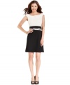 Tahari by ASL dresses up this number with contrasting colors at the bodice and skirt and a chic pop of lace at the waist.