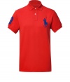 Detailed in breathable and durable cotton mesh, Ralph Laurens big pony polo is a cool modern take on this classic cut style - Small collar, button placket, short sleeves, oversized embroidered polo player at chest, number patch on sleeve, slit sides, high-low hemline - Classic fit - Wear with everything from jeans and sneakers to colored cords and loafers