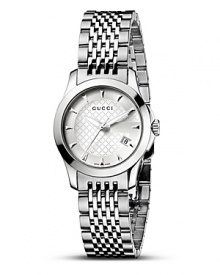 A stainless steel watch from the Gucci G-Timeless collection. Round silver dial with pattern and stick hour indices. Sweep second hand and date window.