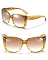 Oversized cat eye sunglasses by Balenciaga are sure to to be your favorite pair this season.