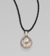 An etched metal sphere with a weathered, antique look hangs from a rich strap of braided buffalo leather in this spirited yet simple piece.Metal Leather Length, about 24 Imported
