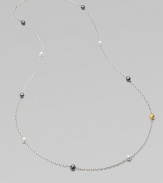 From the Caviar Collection. One extra long, ultra graceful chain of sterling silver, dotted with hammered beads of polished silver, blackened silver, and 24k yellow gold.Sterling silver and 24k yellow goldLength, about 50Spring clip claspImported