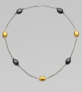 Beautifully textured stations in two-tone sterling silver and radiant 24k gold on a sterling silver link chain. Two-tone sterling silver24k goldLength, about 16 to 18 adjustableLobster clasp closureImported 