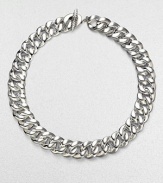 From the Cordelia Collection. Polished sterling silver in an undulating curb chain design.Sterling silver Length, about 18¾ Width, about 18mm Toggle closure Imported 