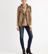 Lush rabbit fur adds volume and texture to this distinctive topper.Foldover collarSleevelessAbout 27 from shoulder to hemGenuine rabbit furSpot cleanImportedFur origin: ChinaModel shown is 5'10 (177cm) wearing US size Small.