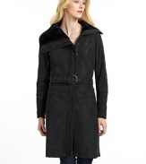 THE LOOKFold-over collarZip frontLong sleeves with zip closuresElastic waist with removable buckled beltDual slit pocketsTHE FITAbout 33 from shoulder to hemTHE MATERIALDyed shearlingCARE & ORIGINDry clean by fur specialistImportedFur origin: China
