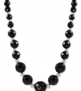 Beautiful in black. Rich onyx (6-12 mm) stands out on this sterling silver necklace with rhodium-plated sparkle beads adding a lustrous touch. Approximate length: 18 inches.