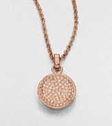 From the Brilliance Collection. A pretty pavé pendant has a slight concave shape that enhances the sparkle of its light-catching glass stones as it hangs from a graceful rose-finished chain.GlassRose goldtoneChain length, about 16Pendant diameter, about .5Clasp closeImported