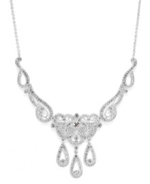 Stylish illumination. Eliot Danori's dazzling and dramatic frontal necklace highlights shimmering crystals in an intricate silver tone mixed metal setting. Approximate length: 16 inches + 2-inch extender. Approximate drop length: 4 inches. Approximate width: 5 inches.