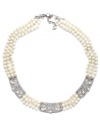 Effortless elegance. Make a stylish statement in this exquisite collar necklace from Carolee. Adorned with imitation pearls and glittering glass accents, it's set in silver tone mixed metal. Approximate length: 16 inches + 2-inch extender.