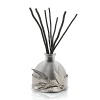 This captivating diffuser by Michael Aram features notes of sandalwood, musk, French lotus, bamboo, waterlily and green ivy. Soothing and sensual, it's an intoxicating scent for the home.