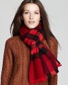 More of a soft thing, Burberry's red check print scarf is oversized and rendered in a luxe wool-cashmere blend.