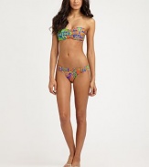Vibrantly designed and featuring unique, twisted sides for a gorgeous effect. Stretch comfortLoop sidesFully lined80% nylon/20% Lycra®Hand washMade in USA of Italian fabric Please note: Bikini top sold separately. 