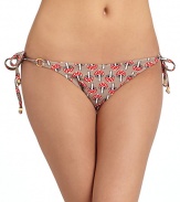 THE LOOKAllover mushroom printSide tie closure with cube bead accentsTHE MATERIAL80% nylon/20% spandexFully linedCARE & ORIGINHand washMade in USAPlease note: Bikini top sold separately. 