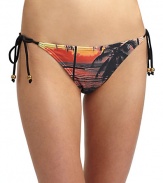 THE LOOKTropical palm printElastic top and leg openingsSide tiesTHE MATERIAL80% nylon/20% spandexFully linedCARE & ORIGINHand washImportedPlease note: Bikini top sold separately. 