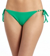 THE LOOKSide tiesGoldtone hardwareElastic waist and leg openingsTHE MATERIAL80% nylon/20% spandexFully linedCARE & ORIGINHand washMade in USAPlease note: Bikini top sold separately. 