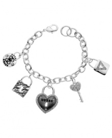 Put a lock on this charming style. GUESS's trendy bracelet features a mix of charms including a crystal-accented lock, a heart-shaped lock, a crystal-accented key and the quattro G logo. Crafted in silver-plated mixed metal and jet epoxy. Approximate length: 7-1/2 inches. Approximate charm drop: 1-1/4 inches.