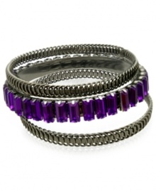 A splash of color changes everything. This set of 3 bangle bracelets from GUESS highlight textured designs and one with amethyst-colored glass baguettes. Crafted in hematite tone mixed metal. Approximate diameter: 2-3/4 inches. A splash of color changes everything. This set of 3 bangle bracelets from GUESS highlight textured designs and one with amethyst-colored glass baguettes. Crafted in hematite tone mixed metal. Approximate diameter: 2-3/4 inches.