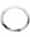 Trend alert: this style is for stacking! Whether you layer it up, or wear it solo, T Tahari's trendy hammered bangle is an instant hit. Crafted in silver tone mixed metal. Base metal is nickel free for sensitive skin. Approximate diameter: 2-1/2 inches.