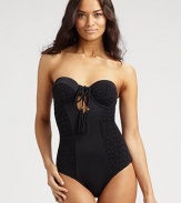 Impeccably designed to turn heads, a swim style that offers an elegant look and stretch comfort.Bandeau topTassle self-tieRemovable strapsKeyhole frontBack clasp closure84% nylon/16% spandexFully linedHand washImported