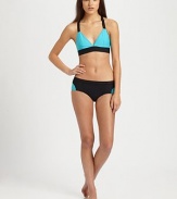 An intriguing take on a classic swim design with a rocker-chic mesh waistband and on-trend colorblocking.Stretch comfortMesh waistbandFully lined80% polyamide/20% elastaneHand washMade in USA of Italian fabric Please note: Bikini top sold separately. 