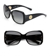 This classically shaped, acetate frame features a full rim style and interchangeable black or ivory logo dics on the temples. Available in black with grey gradient lens. Interchangeable black or ivory logo dics temples100% UV protectionImported