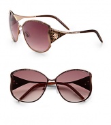 Contoured metal frames with wild, animal-printed logo temples. Available in bronze with gradient brown lens or gunmetal with smoke lens.Animal printed logo temples100% UV protectionMade in Italy