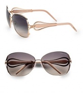 A chic style with animal appeal and acetate temples. Available in rose gold/pearl beige with smoke/beige gradient lens. Logo end-pieces100% UV protectionMade in Italy 