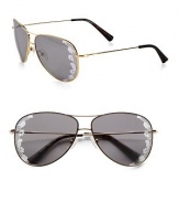 The always on-trend aviator is accented by a beautiful lace lens trim. Available in light gold with flash lens.Metal temples100% UV protectionMade in Italy