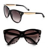 Retro-inspired plastic frames with metal accented logo temples. Available in black with brown gradient lens. Metal logo temples100% UV protectionMade in Italy 