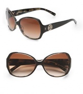A classic, acetate style in a very flattering shape. Available in black marble with brown rose lens or tortoise with brown rose lens. Logo temples100% UV protectionImported