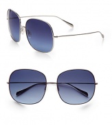 Feminine, oversized, ultra-lightweight titanium frames with polarized lenses and anti-reflective coating. Available in gold with brown gradient lens or silver with blue gradient lens.Metal temples100% UV protectionImported